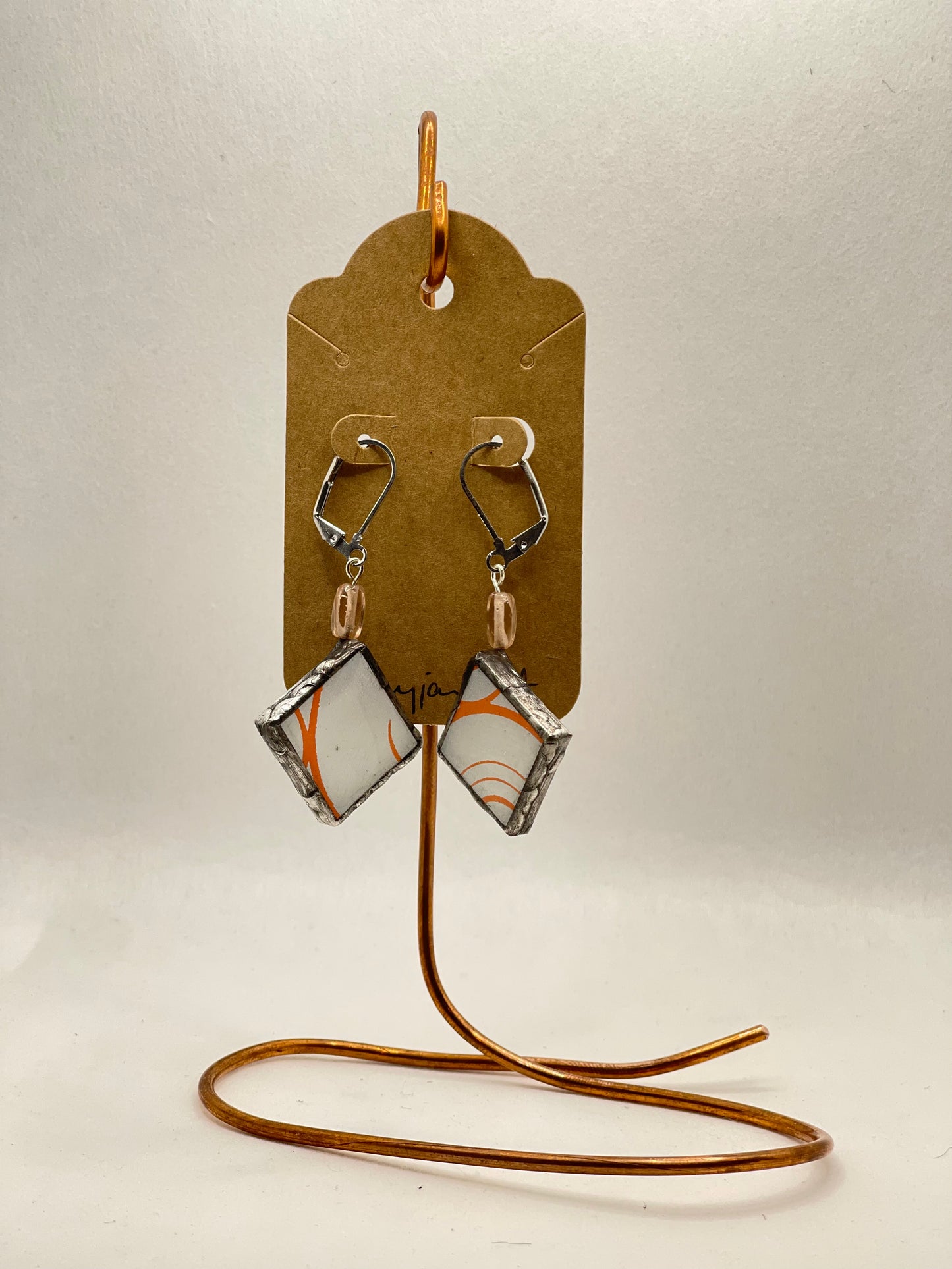 Earrings, mosaic tile, peach, and white swirl